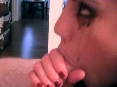 Brunette hottie is in the kitchen giving him a fantastic blowjob