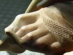 Beautiful girl slowly puts on stockings